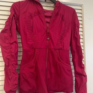 Cranberry Red Lulu zip up hooded jacket.